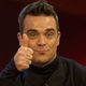 No regrets for Robbie Williams when it comes to his tax burden